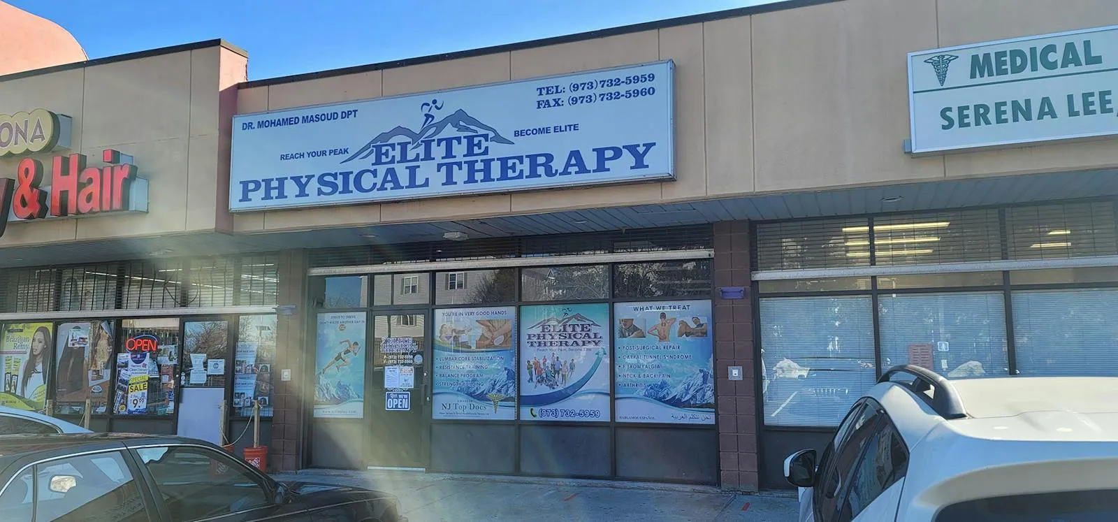 The Newark clinic storefront, with a sign reading “Dr. Mohamed Masoud DPT, Elite Physical Therapy, Reach your peak, become Elite”